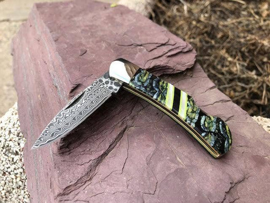 Mammoth Tooth and Green G-10 Lockback Knife